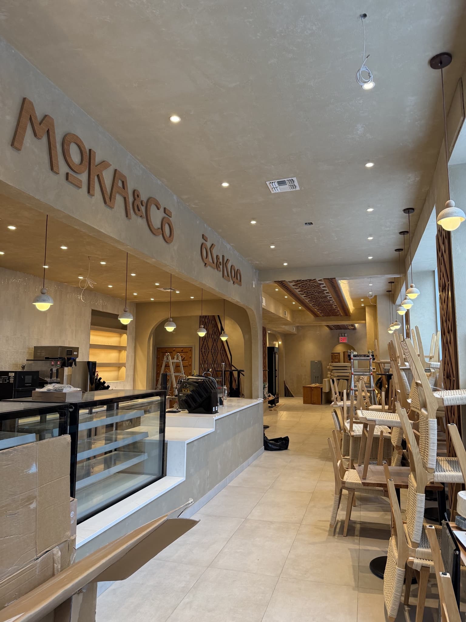 NYC restaurant commercial electrical fit-out with pendant and recessed lighting points.