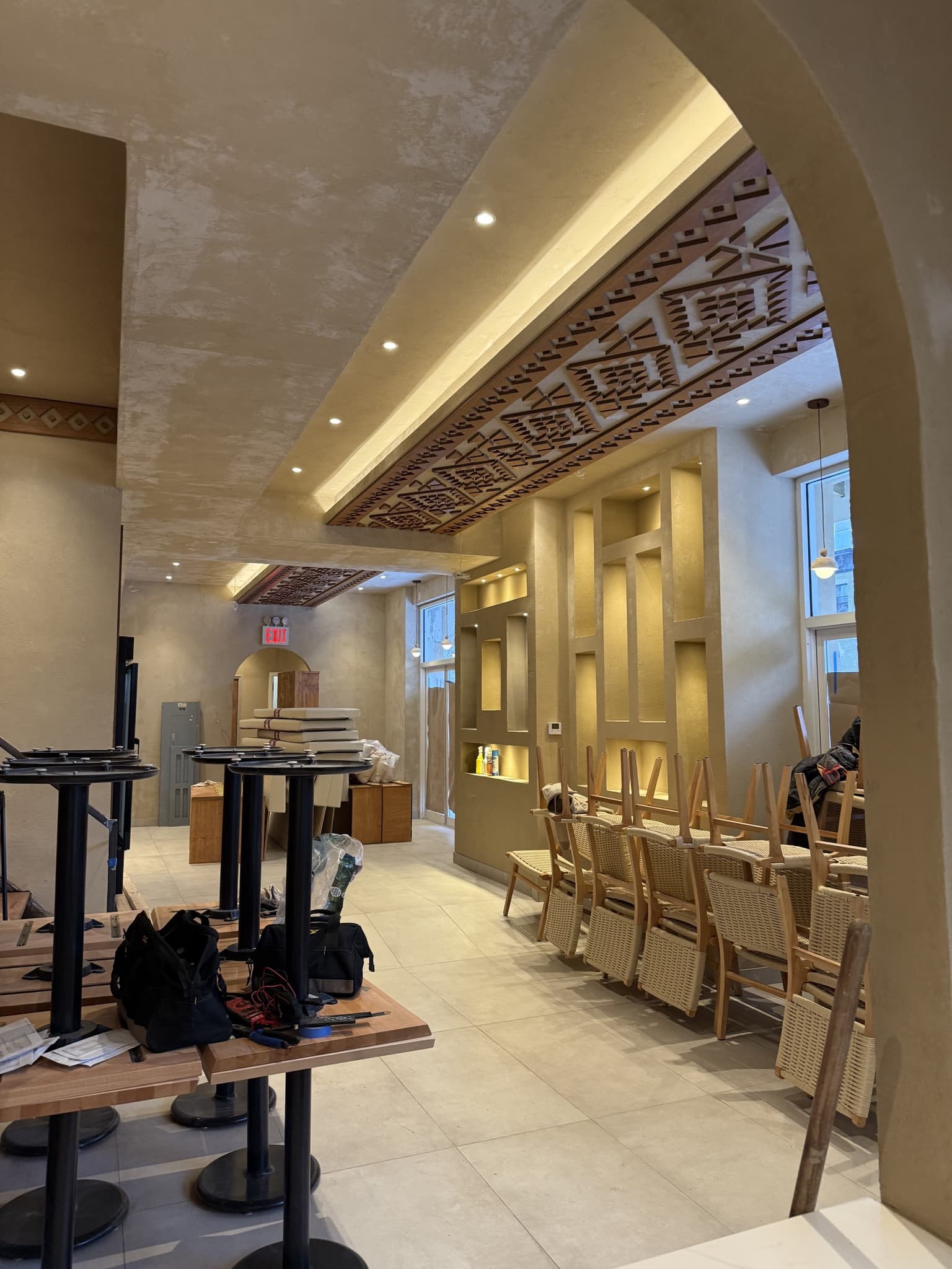 NYC commercial office ceiling lighting layout showing pendant drops and recessed installations.