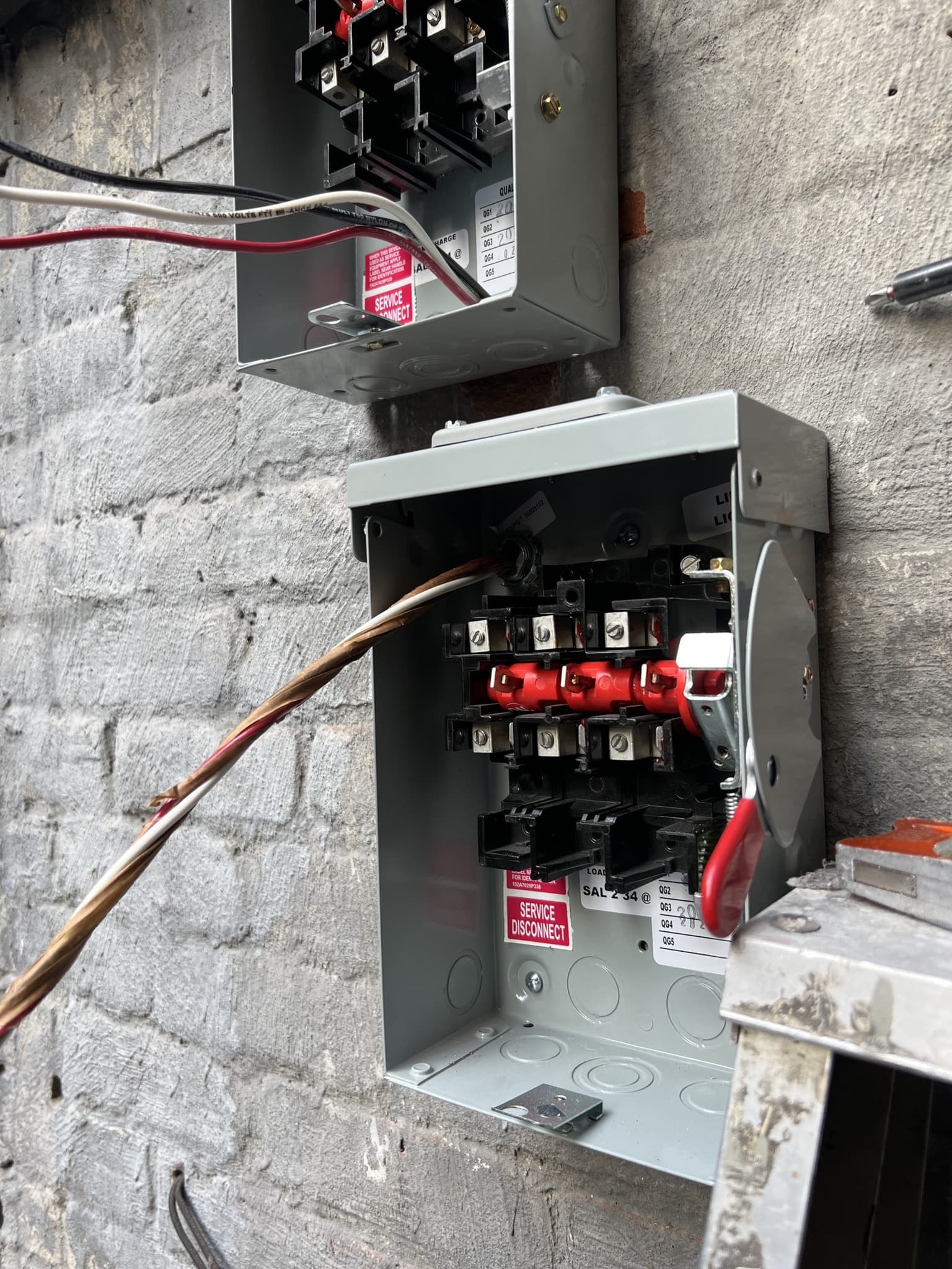 NYC condo garage electrical service upgrade with panel access for EV-ready infrastructure.